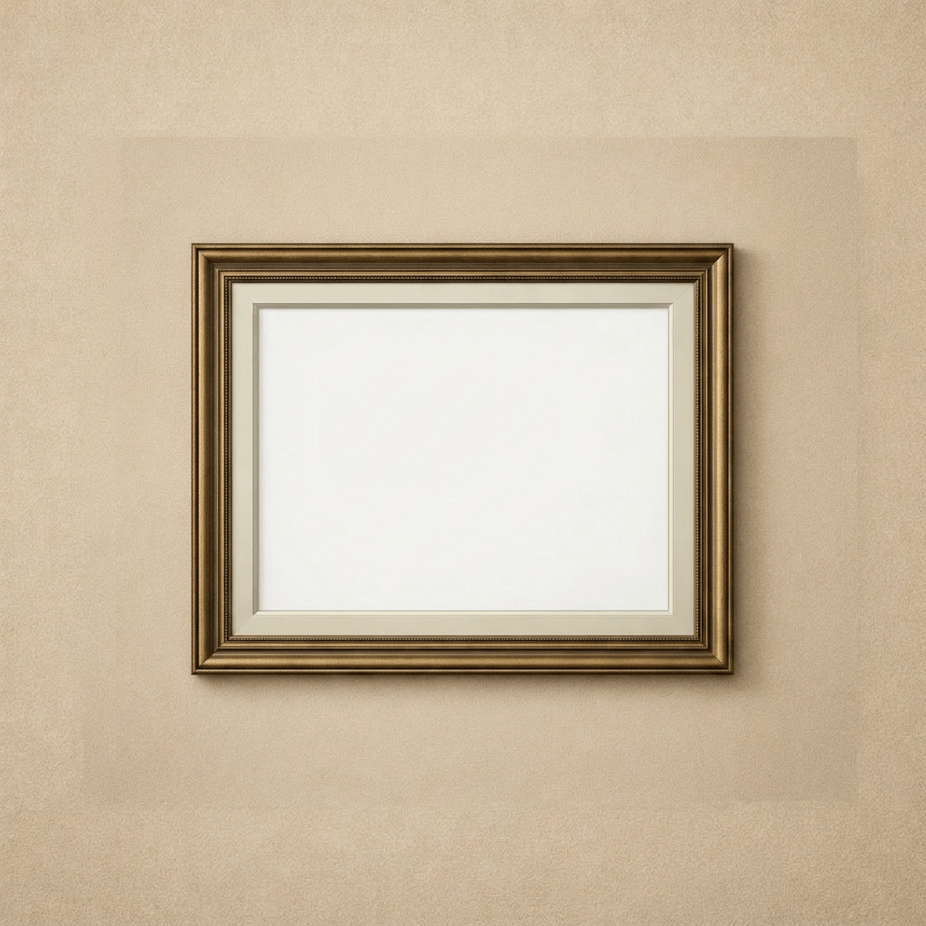 Ornate gold picture frame with white matting on beige wall